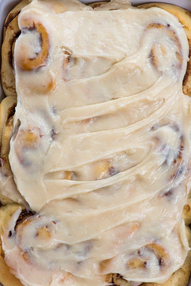 overhead shot of frosted cinnamon rolls
