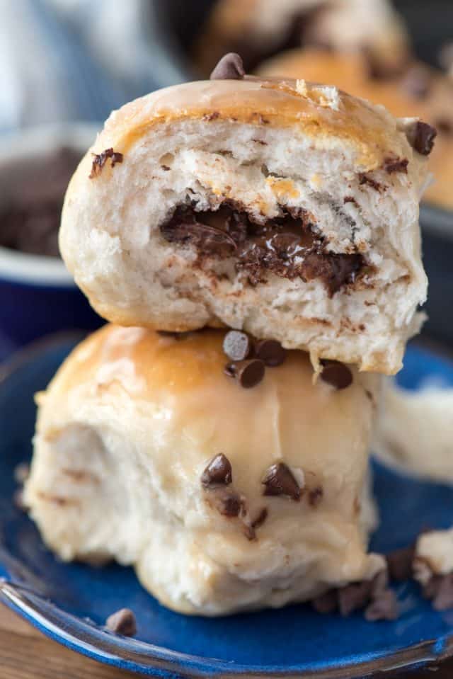 stack of biscuit bombs cut open on blue plate