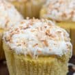 unwrapped coconut cupcake up close
