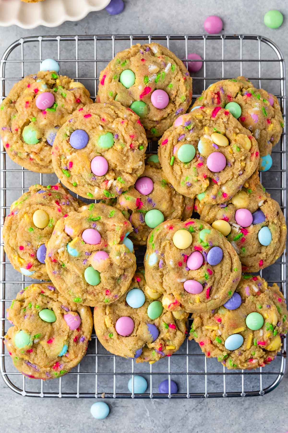 cookies stacked on rack with M&Ms