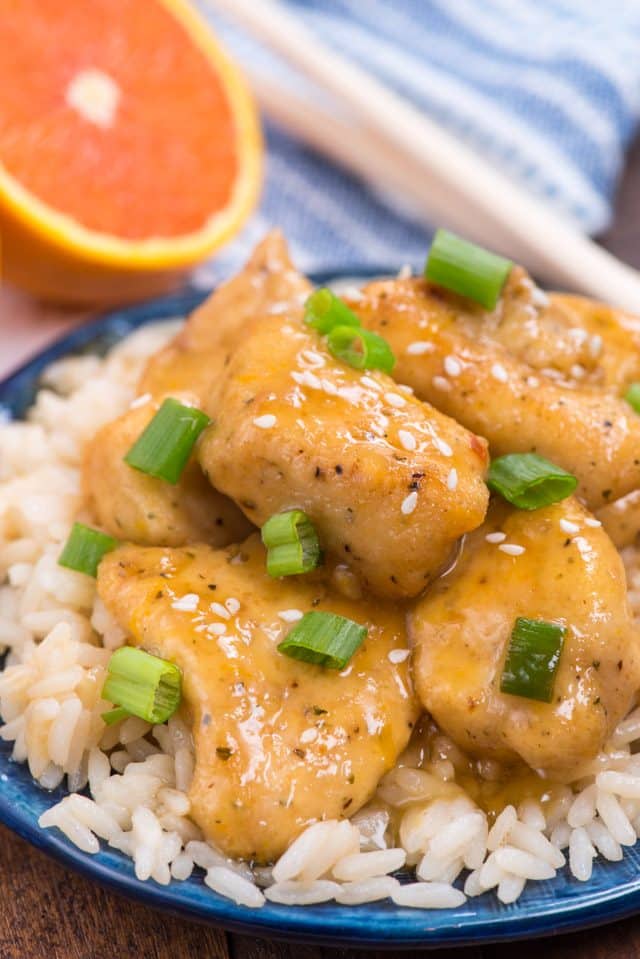 orange chicken recipe on blue plate