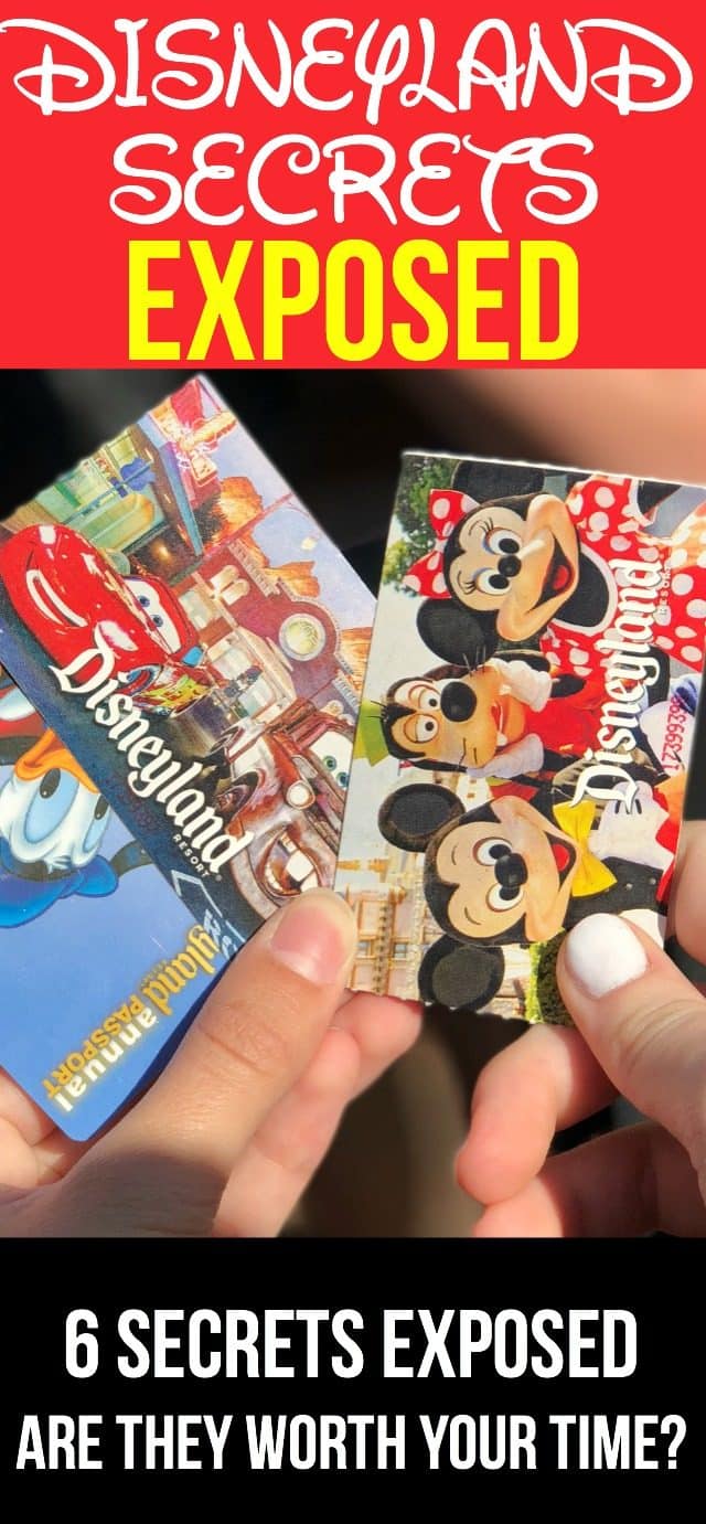 hands holding Disneyland tickets