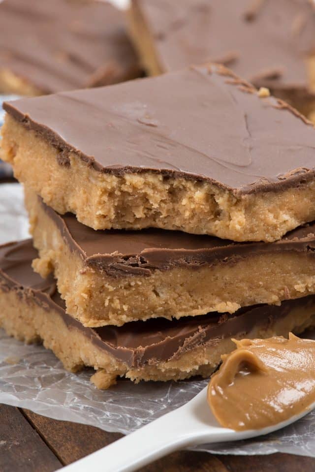 stack of peanut butter bars with bite missing