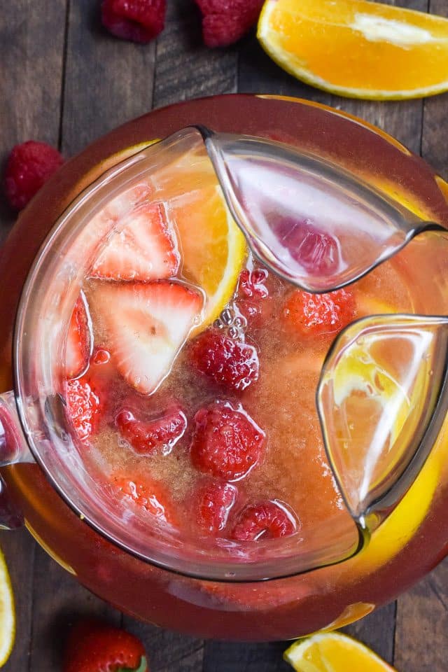 overhead shot of pink mimosa punch pitcher