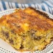 slice of sausage egg casserole on white plate