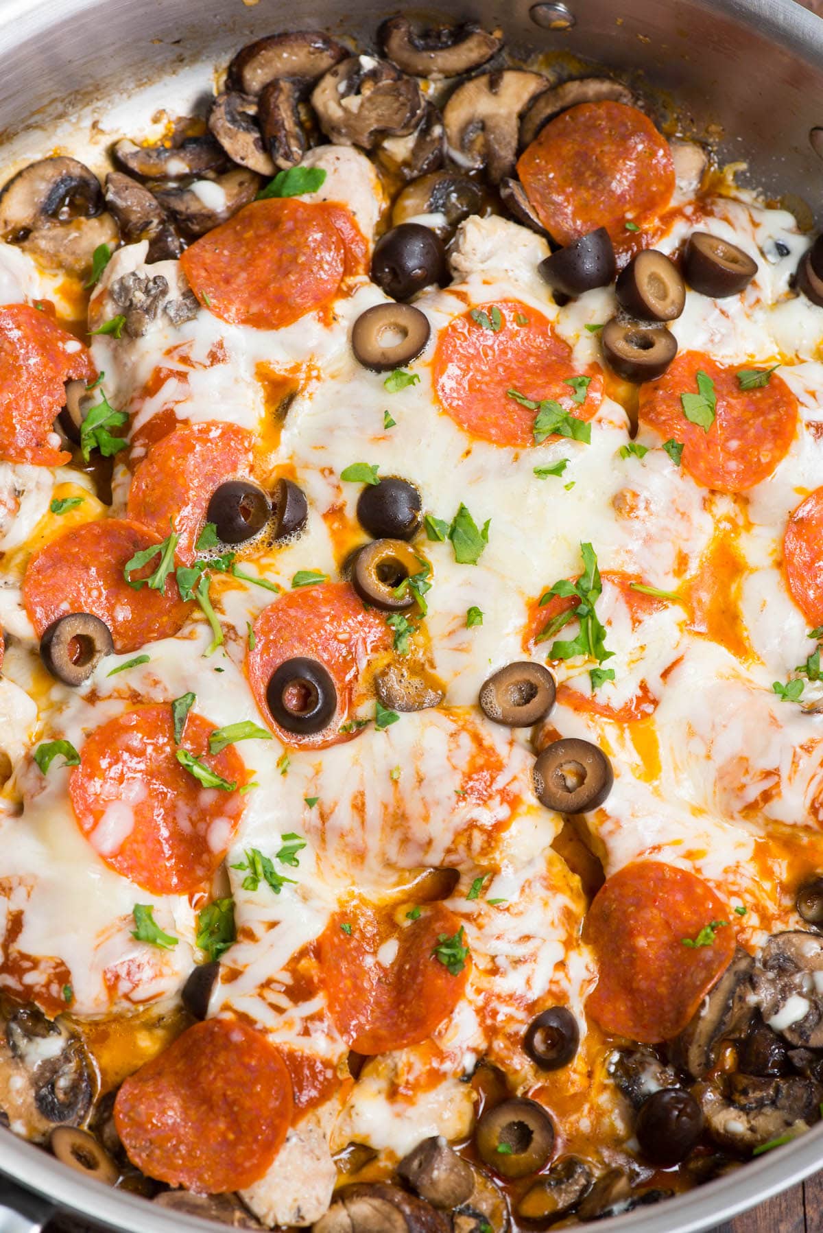 pizza topped chicken in skillet