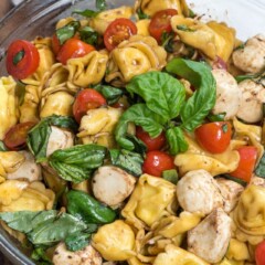 overhead shot of caprese pasta salad in bowl