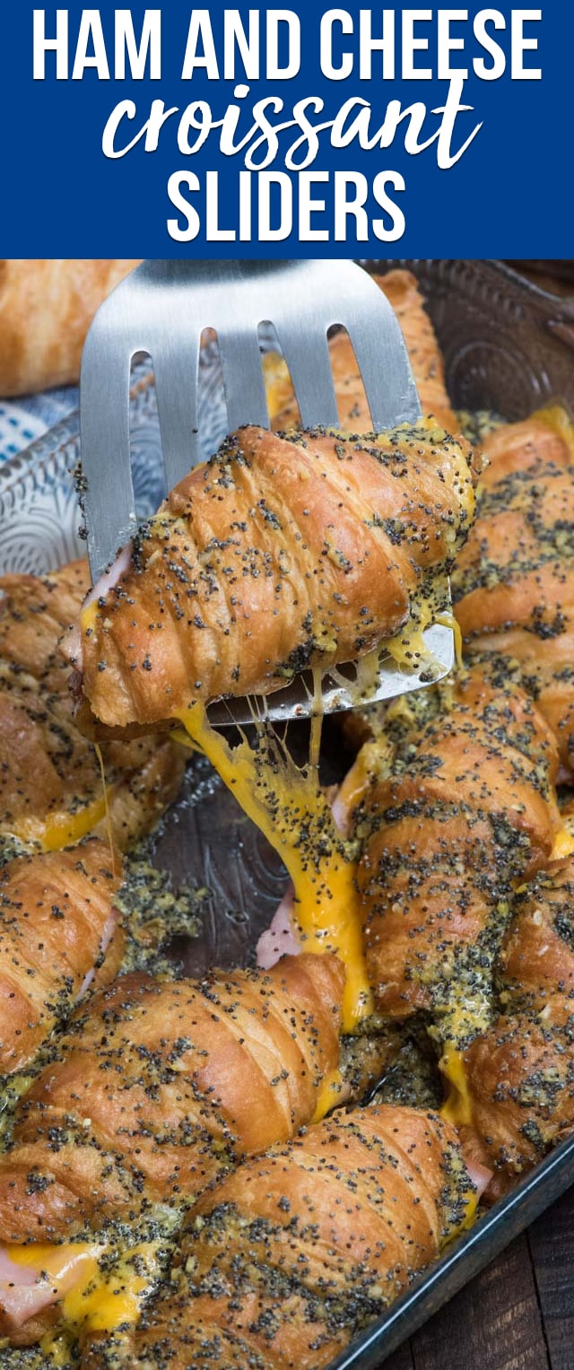 Ham and Cheese Croissant Sliders are easy to make for a crowd! Fill butter croissants with ham and cheddar and bake with a buttery mustard and poppyseed sauce. These got rave reviews!