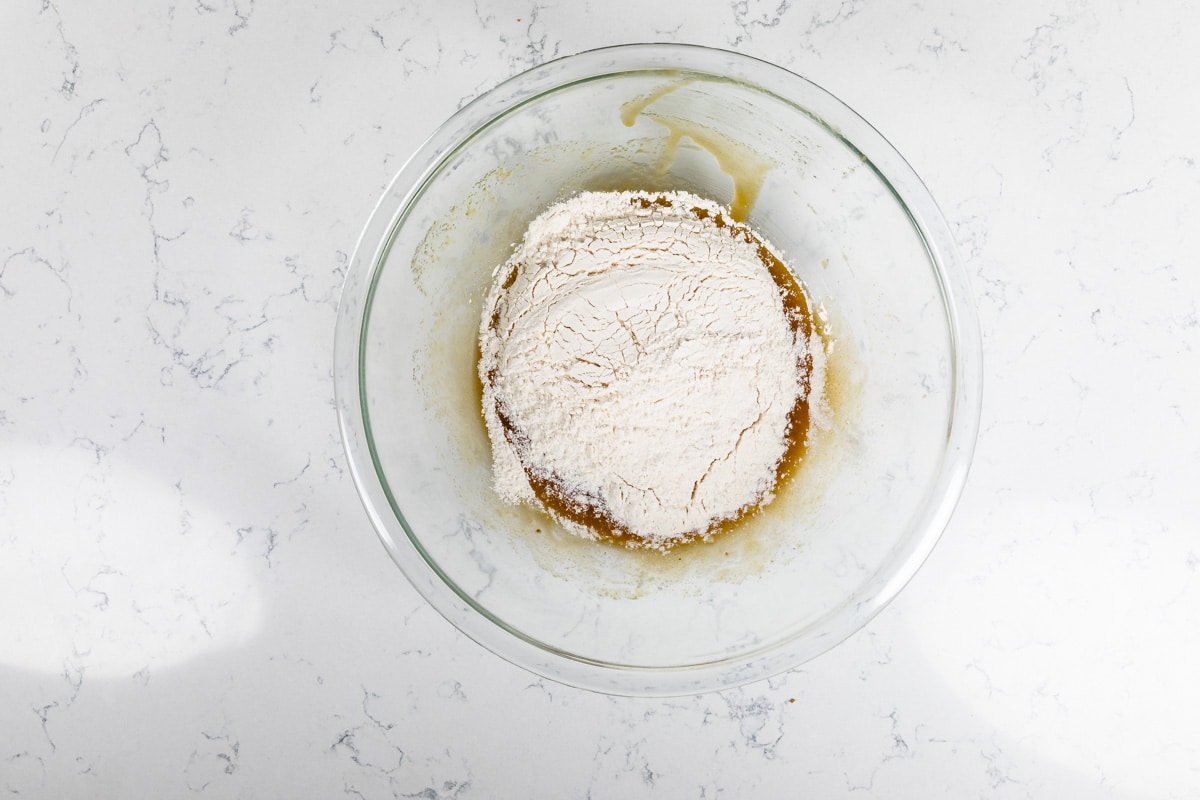 cookie dough in bowl with flour.