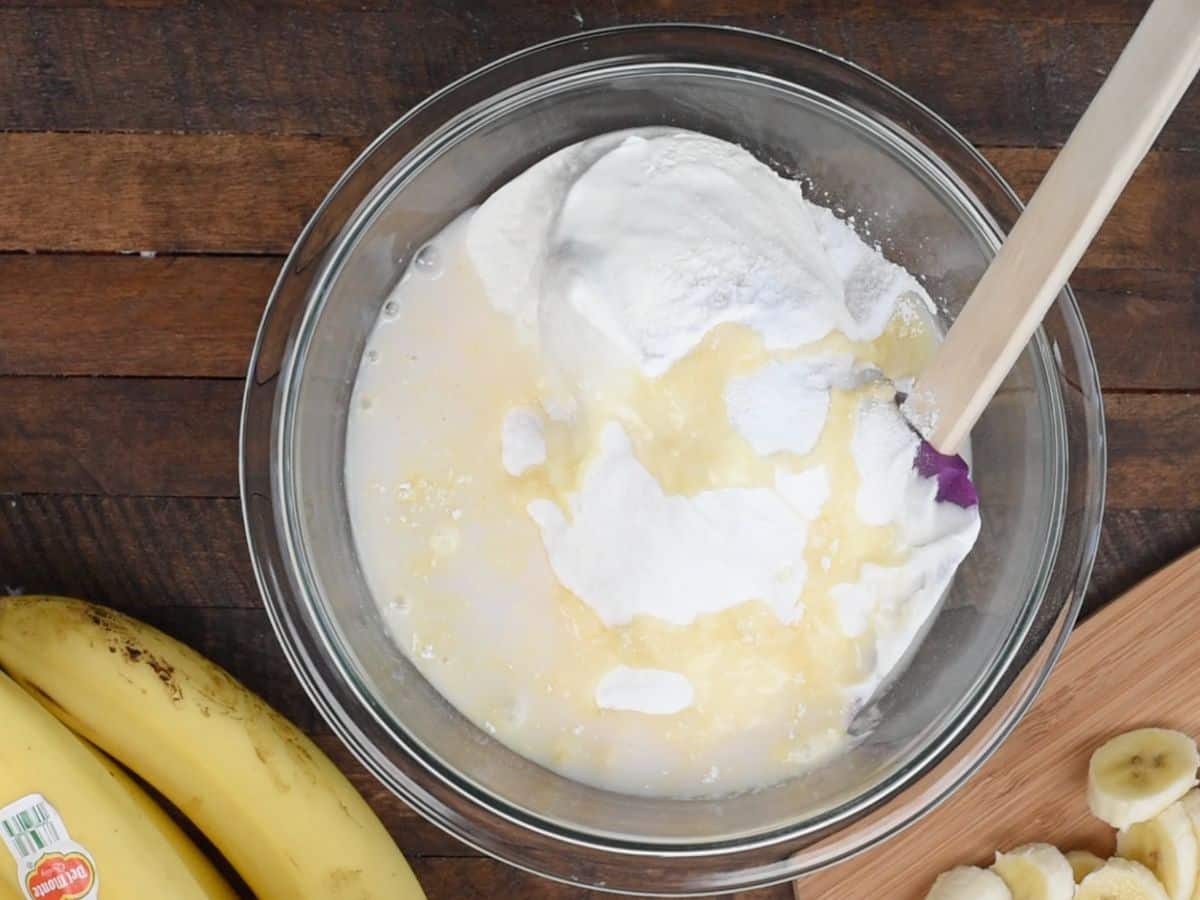 bowl with cool whip and milk and pudding mix.