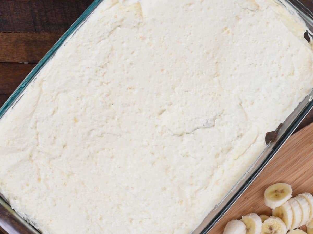 frosted cake in pan.