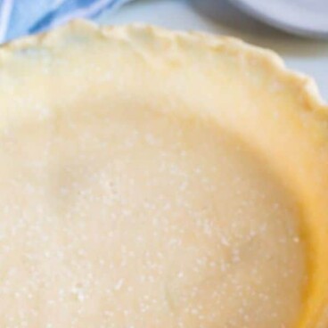 This EASY Pie Crust Recipe with butter is the best homemade flaky pie crust you'll ever make. NEVER buy a store bought pie crust again once you make this one!