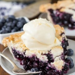slice of blueberry pie with ice cream