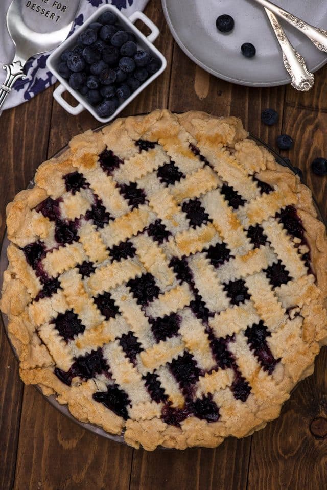 overhead shot of blueberry pie with lattice