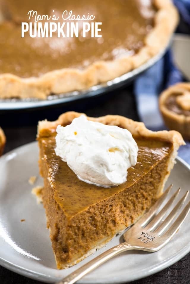 slice of pumpkin pie with whipped cream