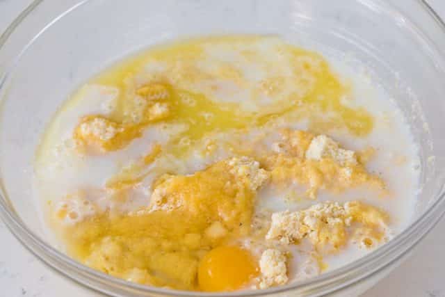 Mexican cornbread stuffing ingredients in a glass bowl