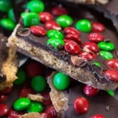 pile of toffee bark with christmas M&Ms