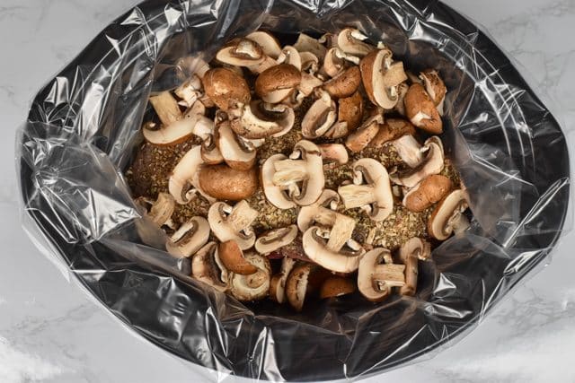 mushrooms on roast in crock pot