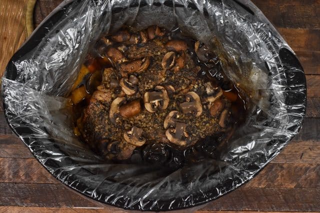 cooked pot roast in crockpot