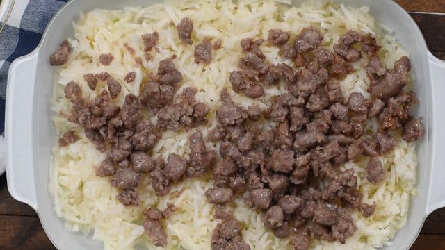 How to make Hashbrown Casserole with sausage, eggs, and cheese.