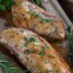 oven baked chicken on cutting board