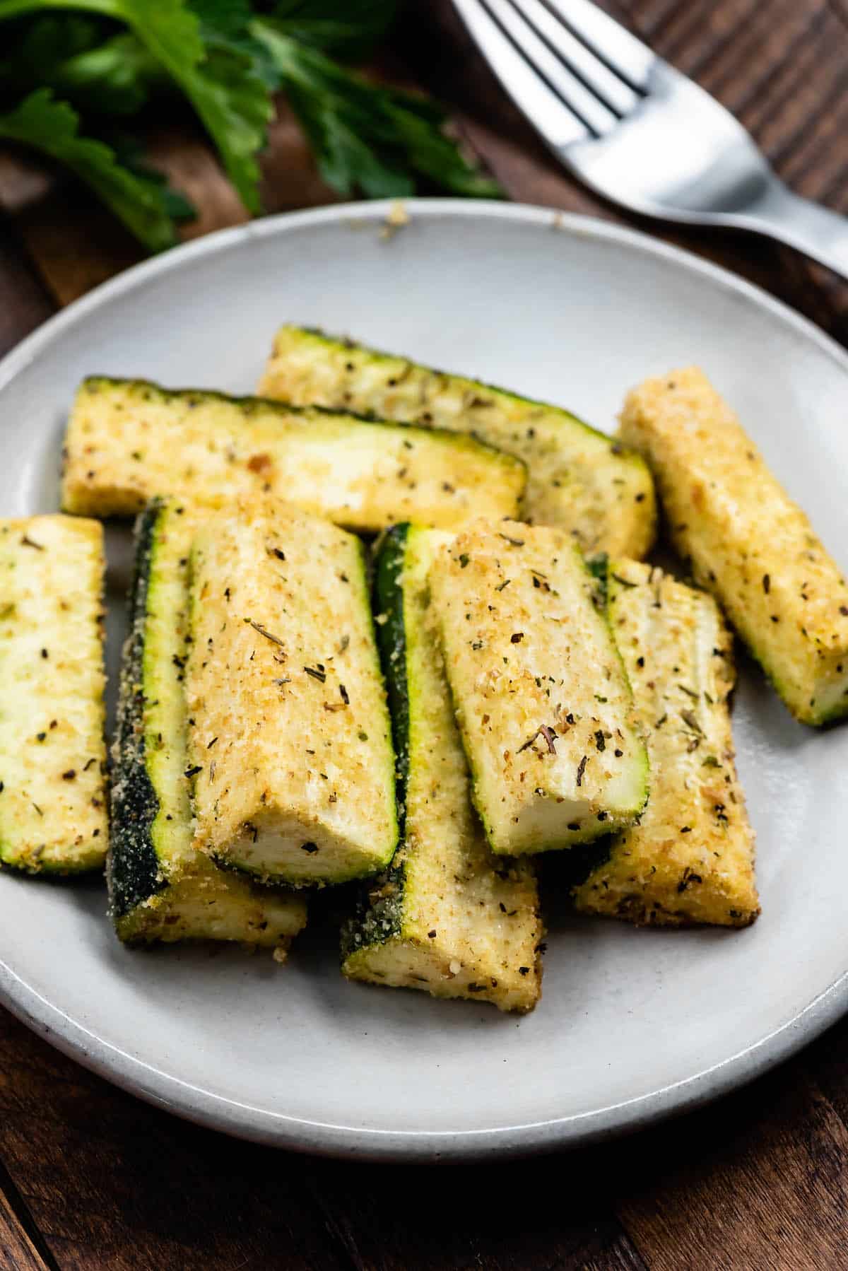 zucchini wedges on white plate.