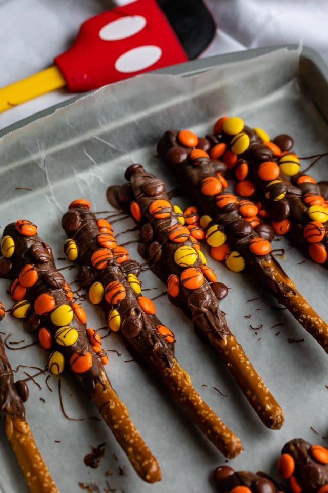 Reese's dipped pretzels on cookie sheet