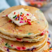 sprinkle pancakes in stack