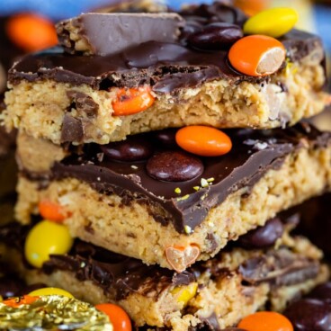 stack of peanut butter bars with bite missing