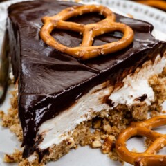 slice of chocolate covered pretzel no bake cheesecake