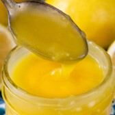 lemon curd in jar with spoon