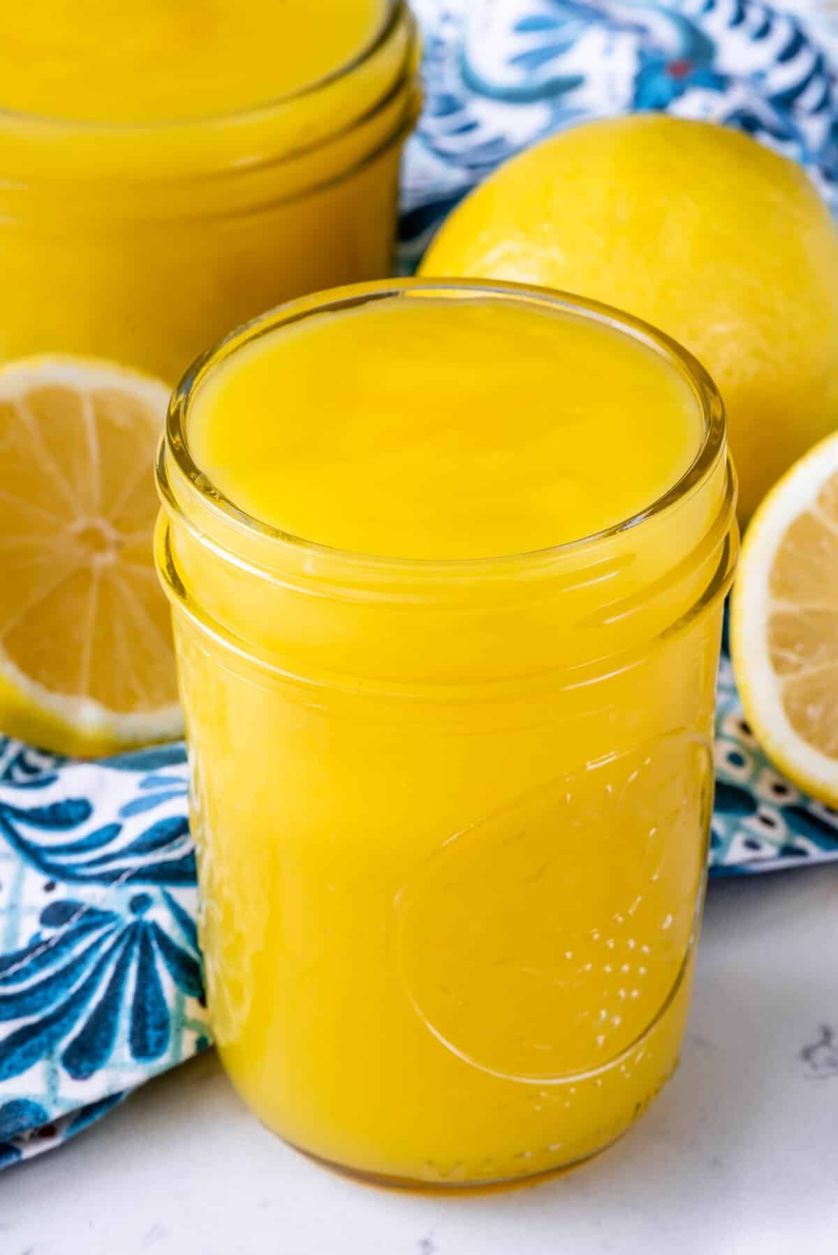 Tall jar of lemon curd.