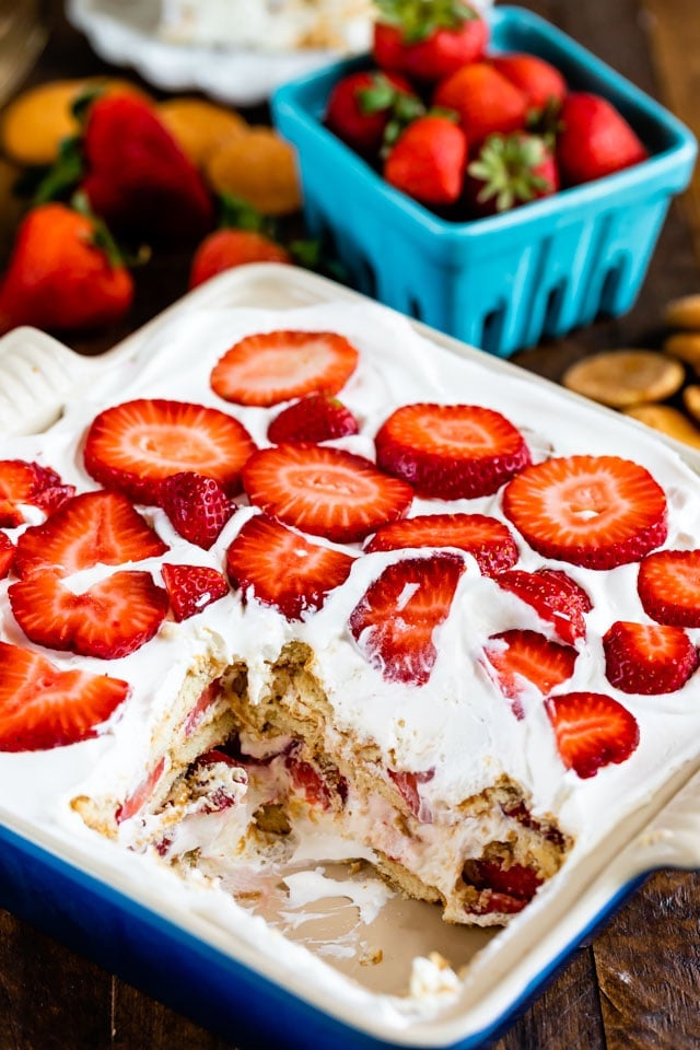 strawberry shortcake icebox cake in pan with slice missing