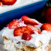 slice of strawberry shortcake icebox cake on plate