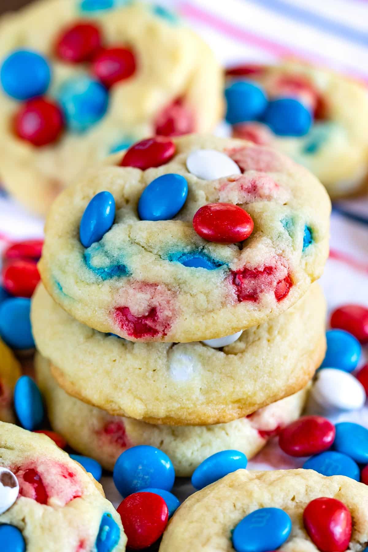 stacked cookies with red white and blue M&Ms baked in with words on the image.