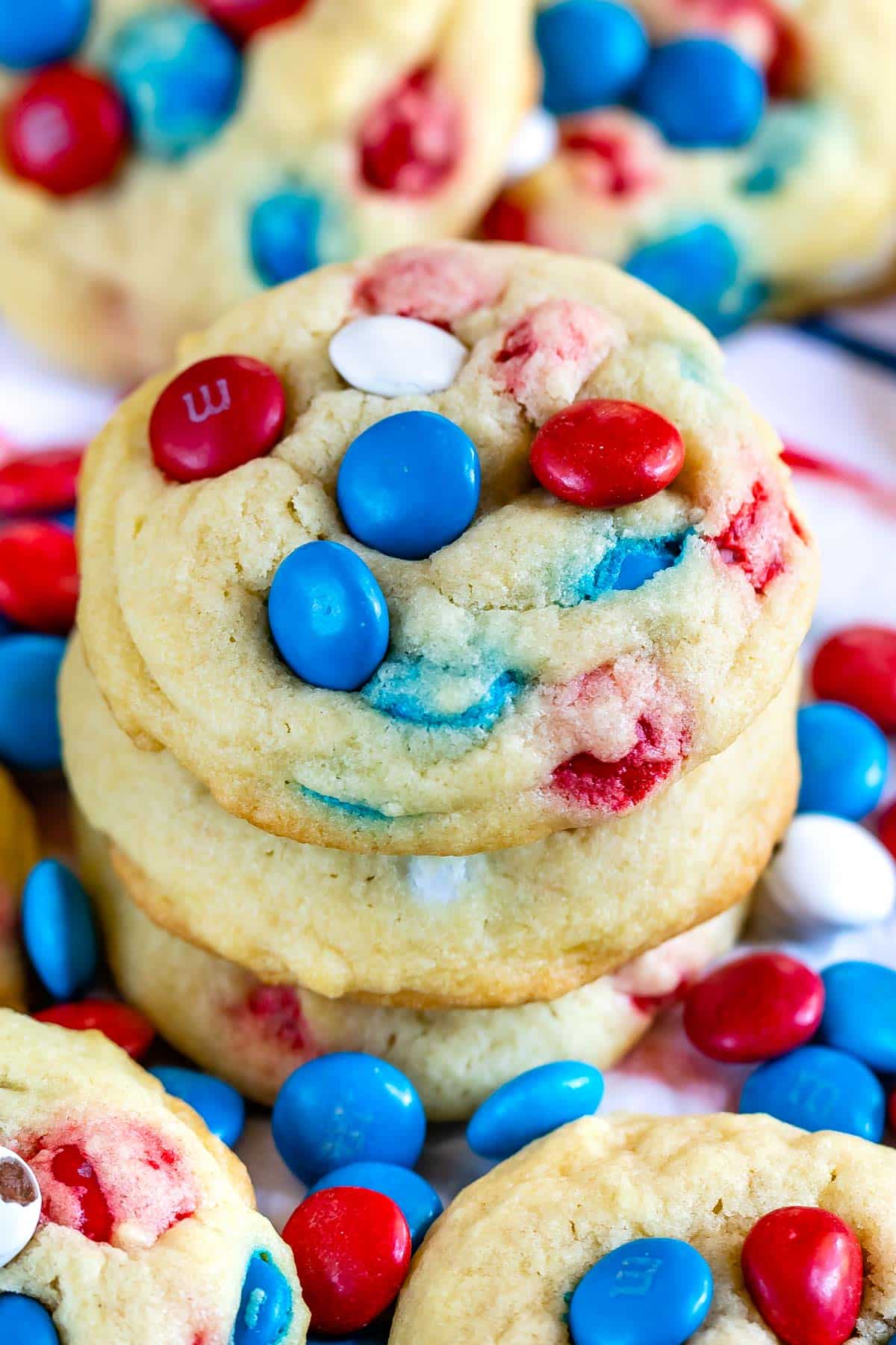 stacked cookies with red white and blue M&Ms baked in with words on the image.