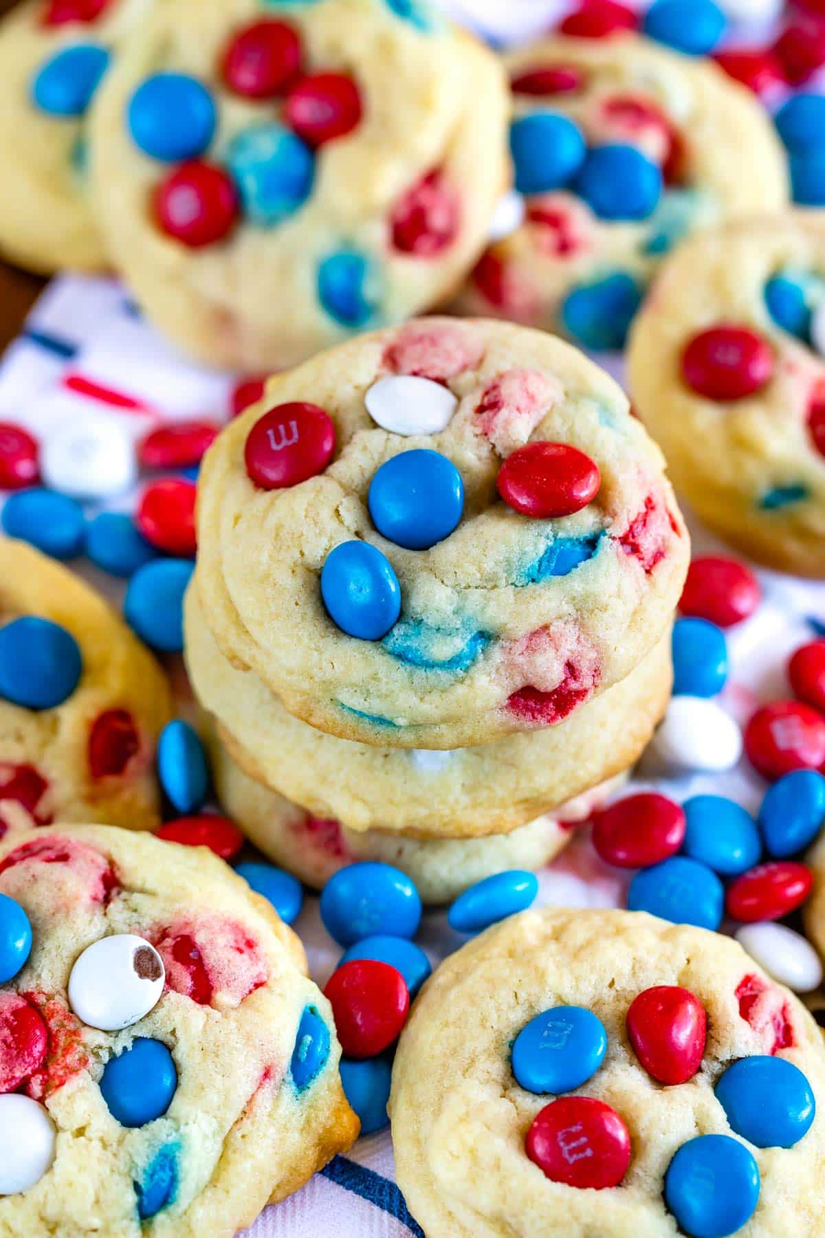 stacked cookies with red white and blue M&Ms baked in with words on the image.