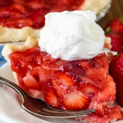 slice of strawberry pie on white plate