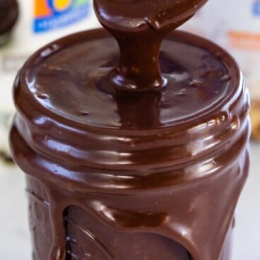 hot fudge sauce with spoon dripping