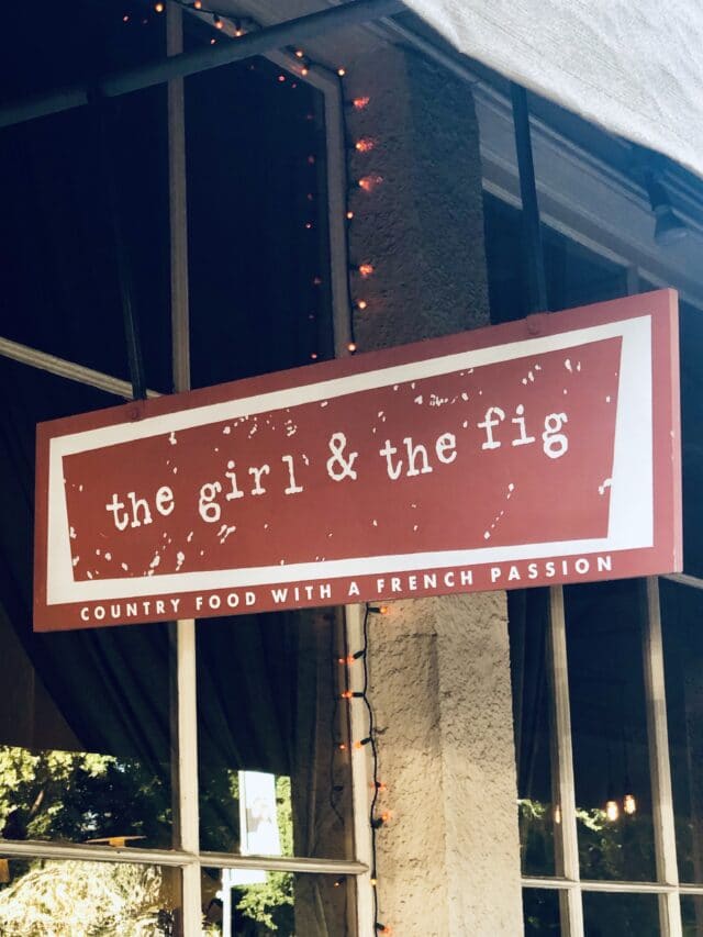 The girl and the fig sign