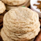 pumpkin spice snickerdoodles in a stack on cutting board