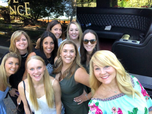 Picture of 9 women in front of a restaurant