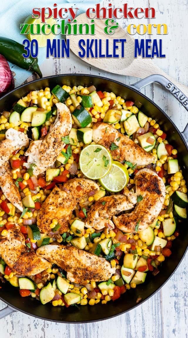 spicy chicken with corn and zucchini in pan
