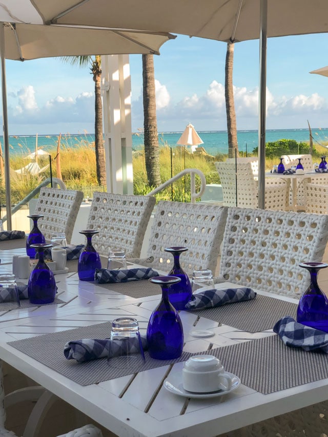 table with beach behind it