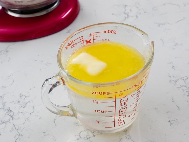 butter and water in measuring cup