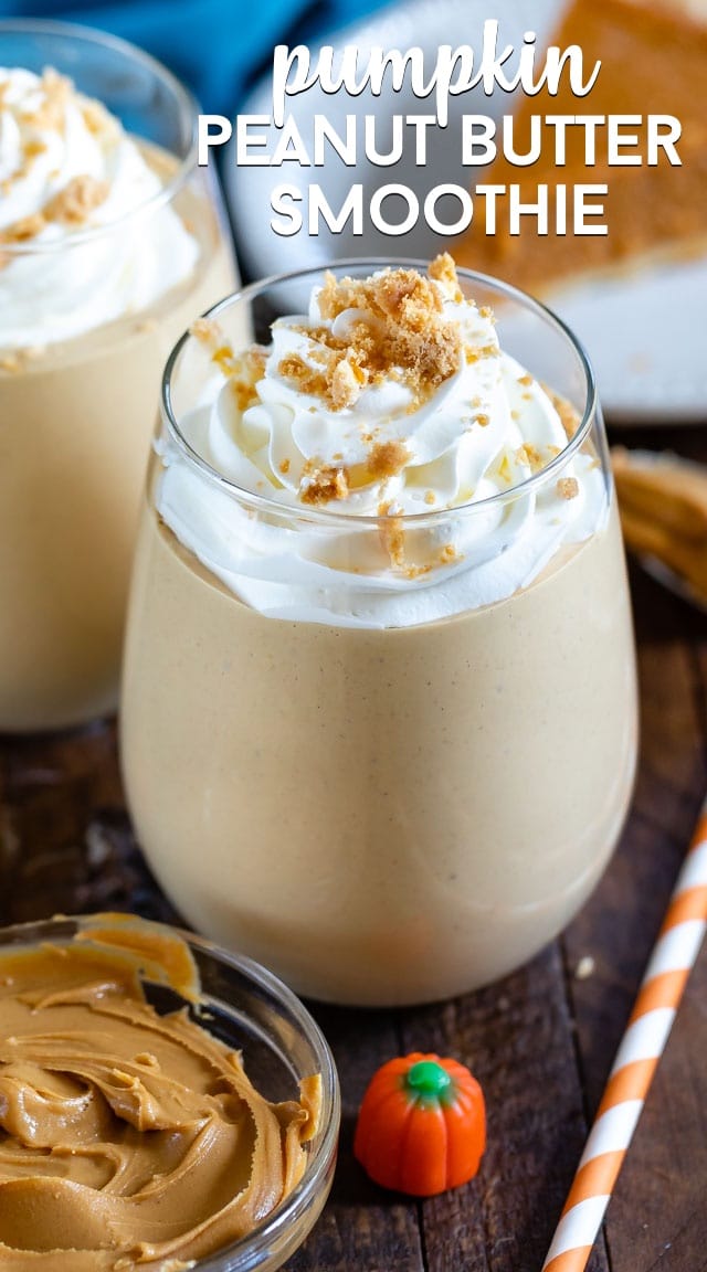 peanut butter smoothie in glass with whipped cream