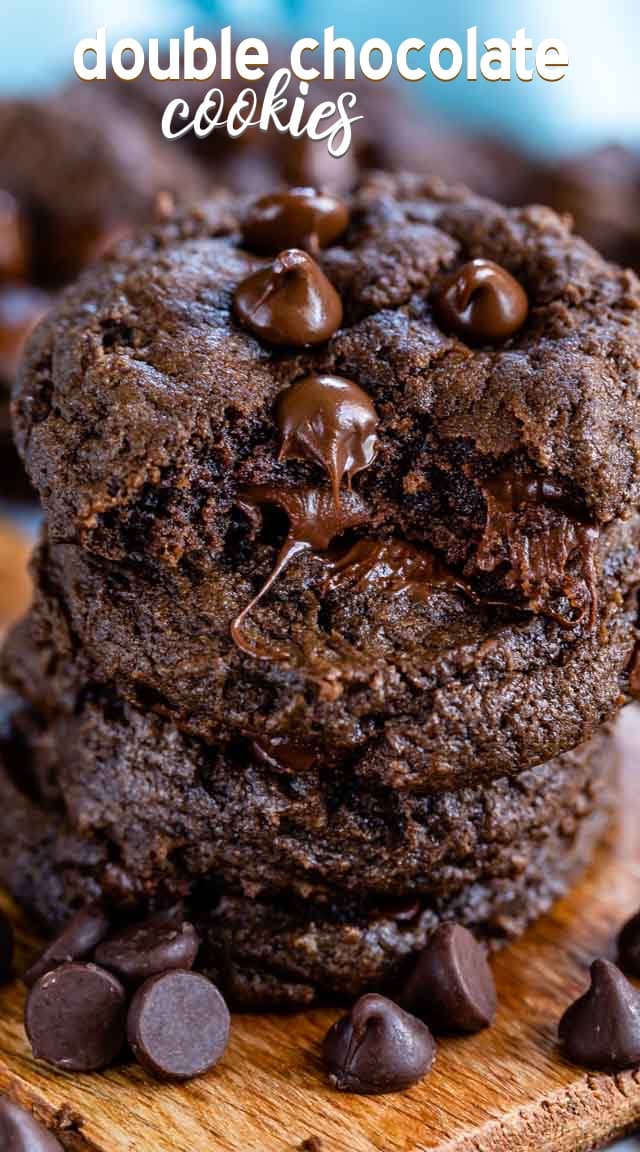 stack of double chocolate chip cookies with bite missing