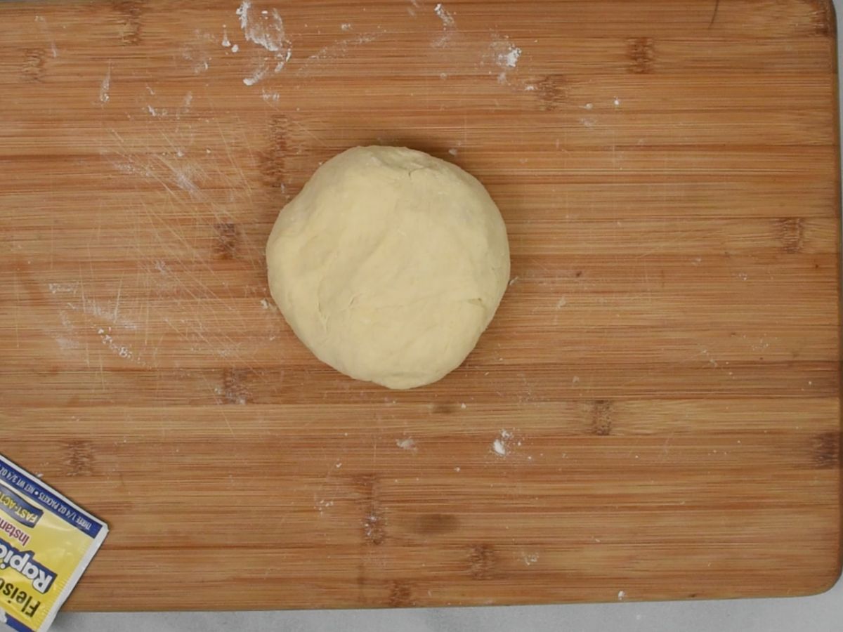 pizza dough on board