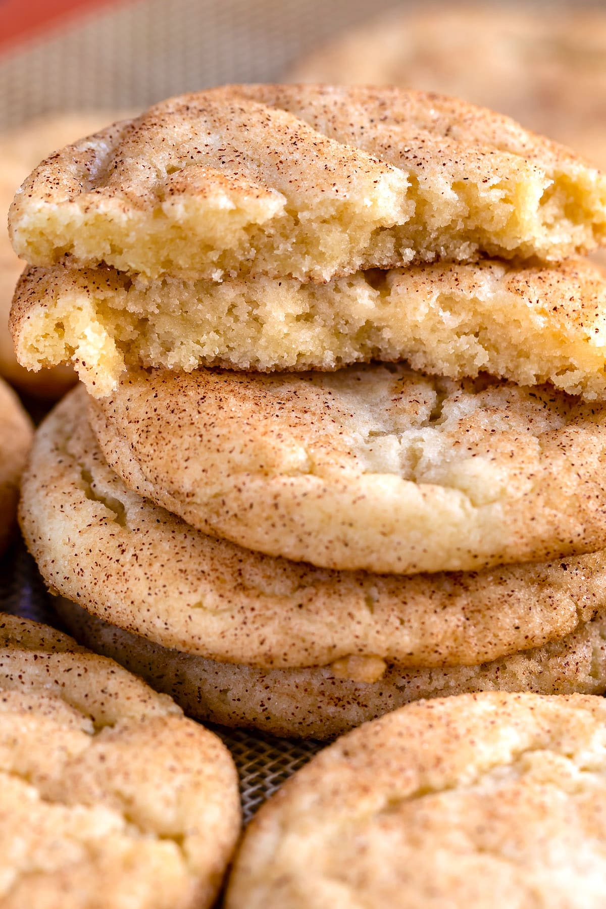 stack of cookies with one cut in half on top.