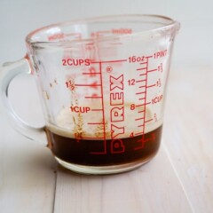 brown butter in measuring cup